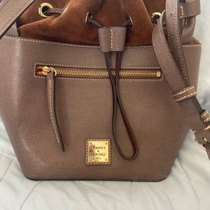 Brown all weather Dooney & Burke bucket bag